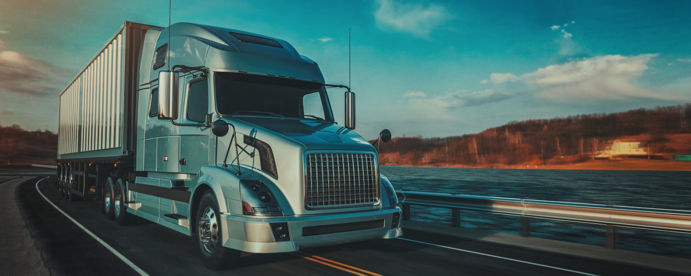 Truck driving along highway for rapid delivery