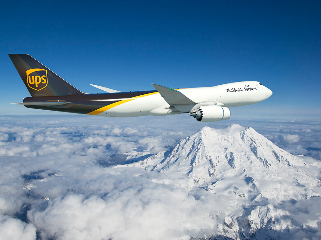 UPS plane flying over mountains